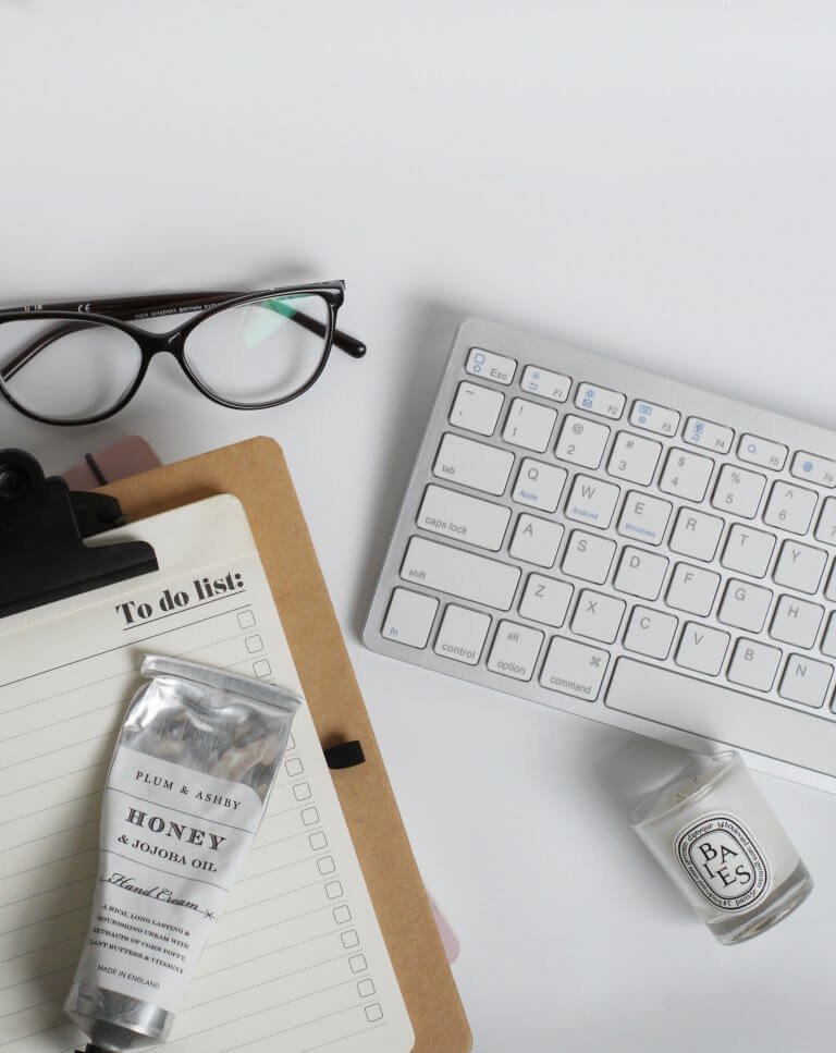 Monochrome Office Flat Lay with Glasses, To Do List and Diptyque Candle