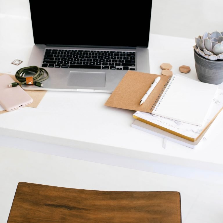 Bloggers Desk Scene - Laptop and Notebooks - 6 Reasons Why You Should Start a Blog Post